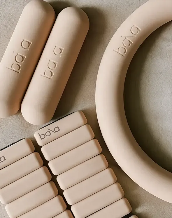 Detail of wellness equipment in soft neutral colours within a calm interior designed by LUV Studio.